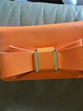 Betsey Johnson Orange Bow-Accent Women’s Clutch